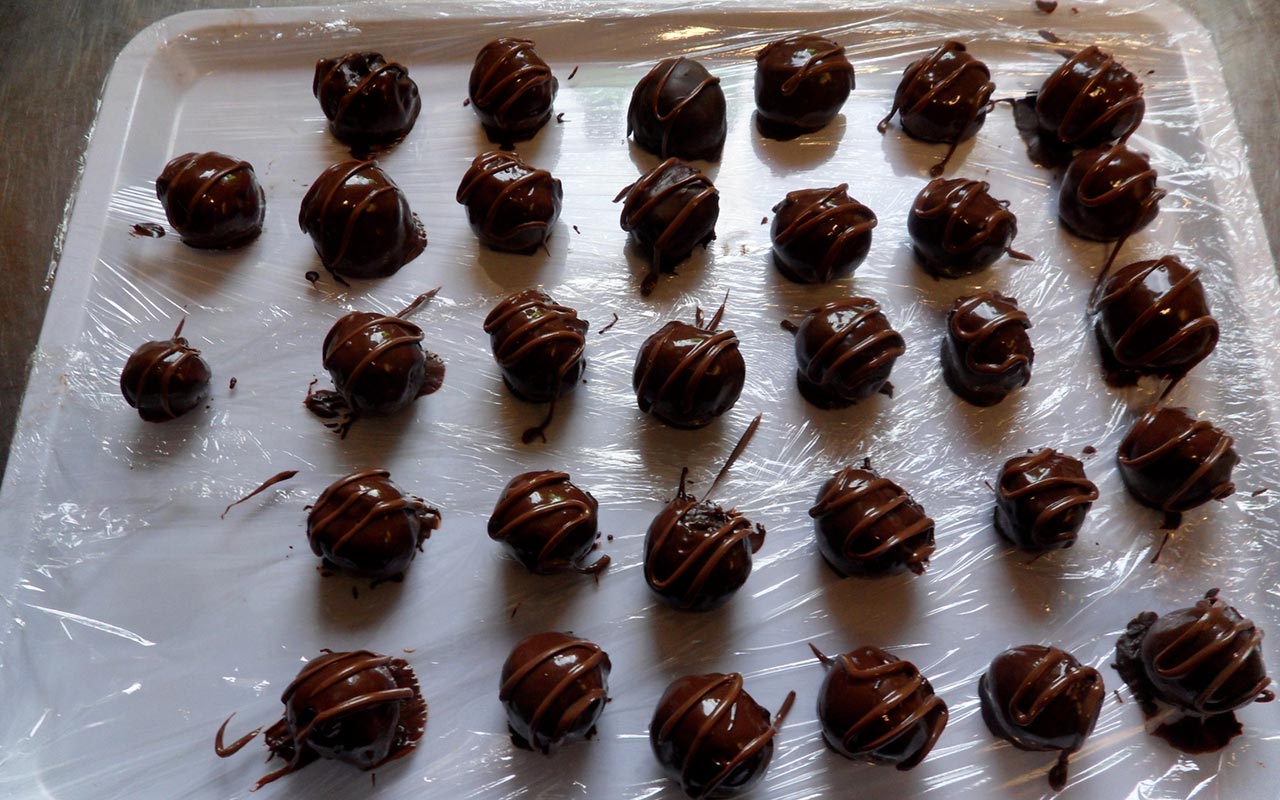Hand-made ball of chocolate on a baking tray